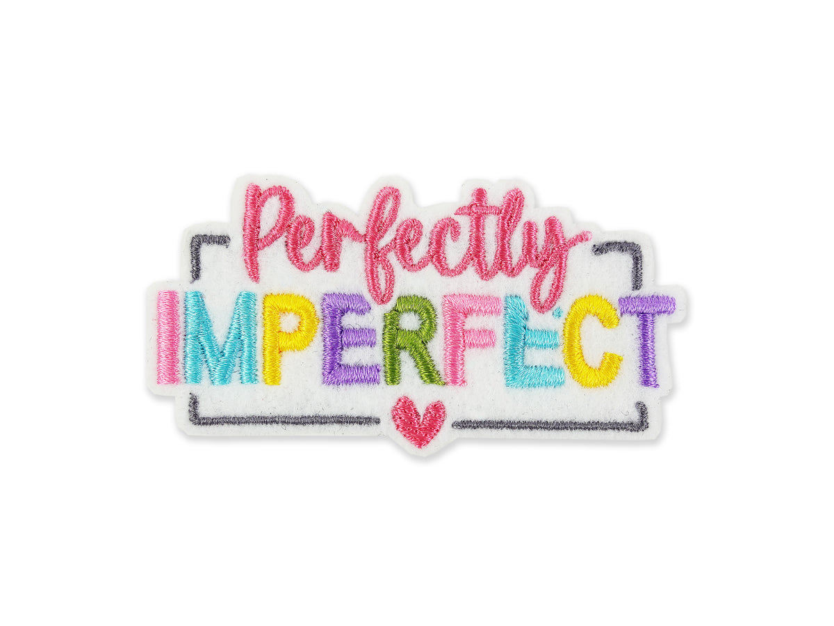 Embroidered patch featuring the words "Perfectly Imperfect" in vibrant rainbow colors with a pink script font for "Perfectly" and a small pink heart detail at the bottom, set against a white background.