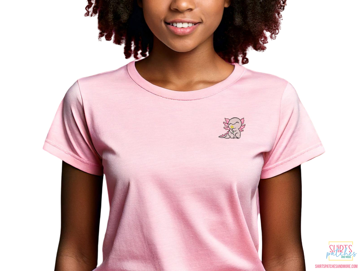 Pink t-shirt featuring the kawaii axolotl holding a flower patch, showing how it looks as a chest logo.
