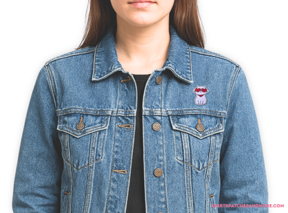 Blue denim jacket featuring the Cool Cat embroidered patch with heart sunglasses on