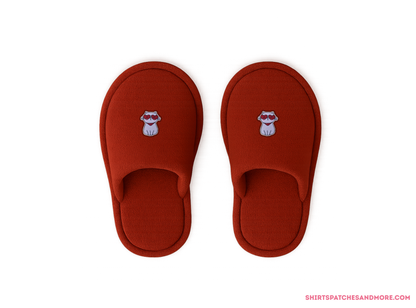 Pair of reddish-brown house slippers featuring the Cool Cat embroidered patch with heart sunglasses