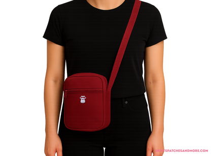 Red crossbody bag featuring the Cool Cat embroidered patch with heart sunglasses o