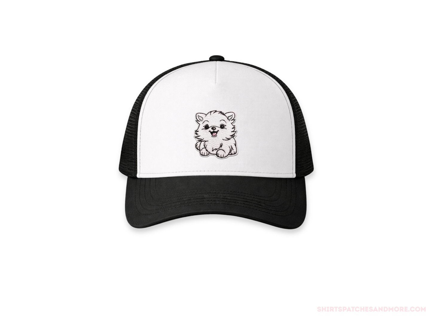 Black and white cap with a  small patch of a White Pomeranian dog on a white background