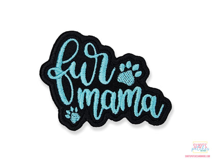 Custom Fur Mama embroidered patch with turquoise script lettering and paw prints for dog moms and pet lovers.