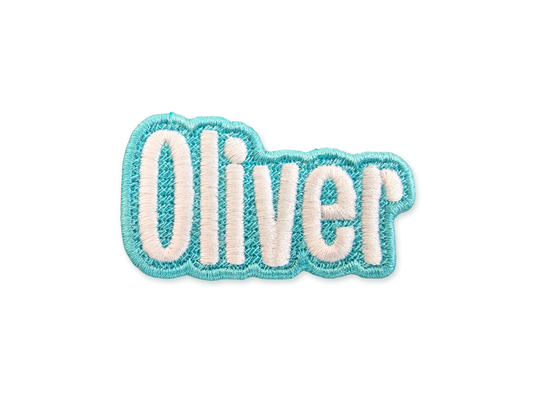 Oliver custom embroidered name patch with light aqua blue border and white script lettering on a white background | Shirts Patches And More
