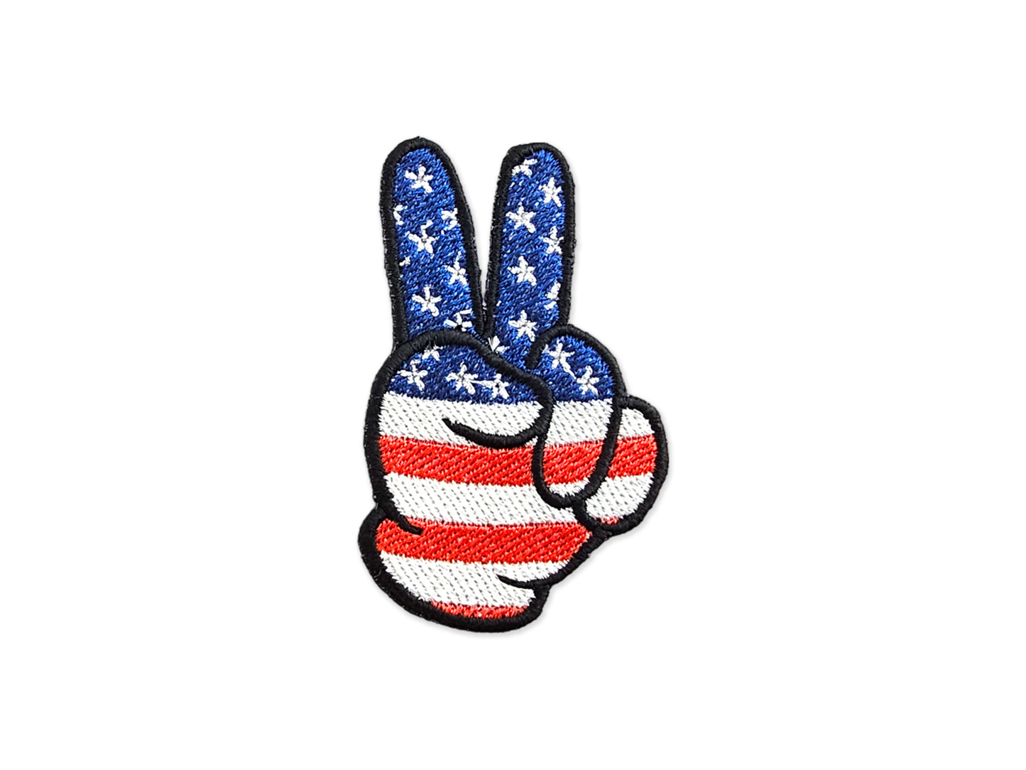 Hand-embroidered peace sign patch featuring a red, white, and blue American flag stars and stripes design on a white background.