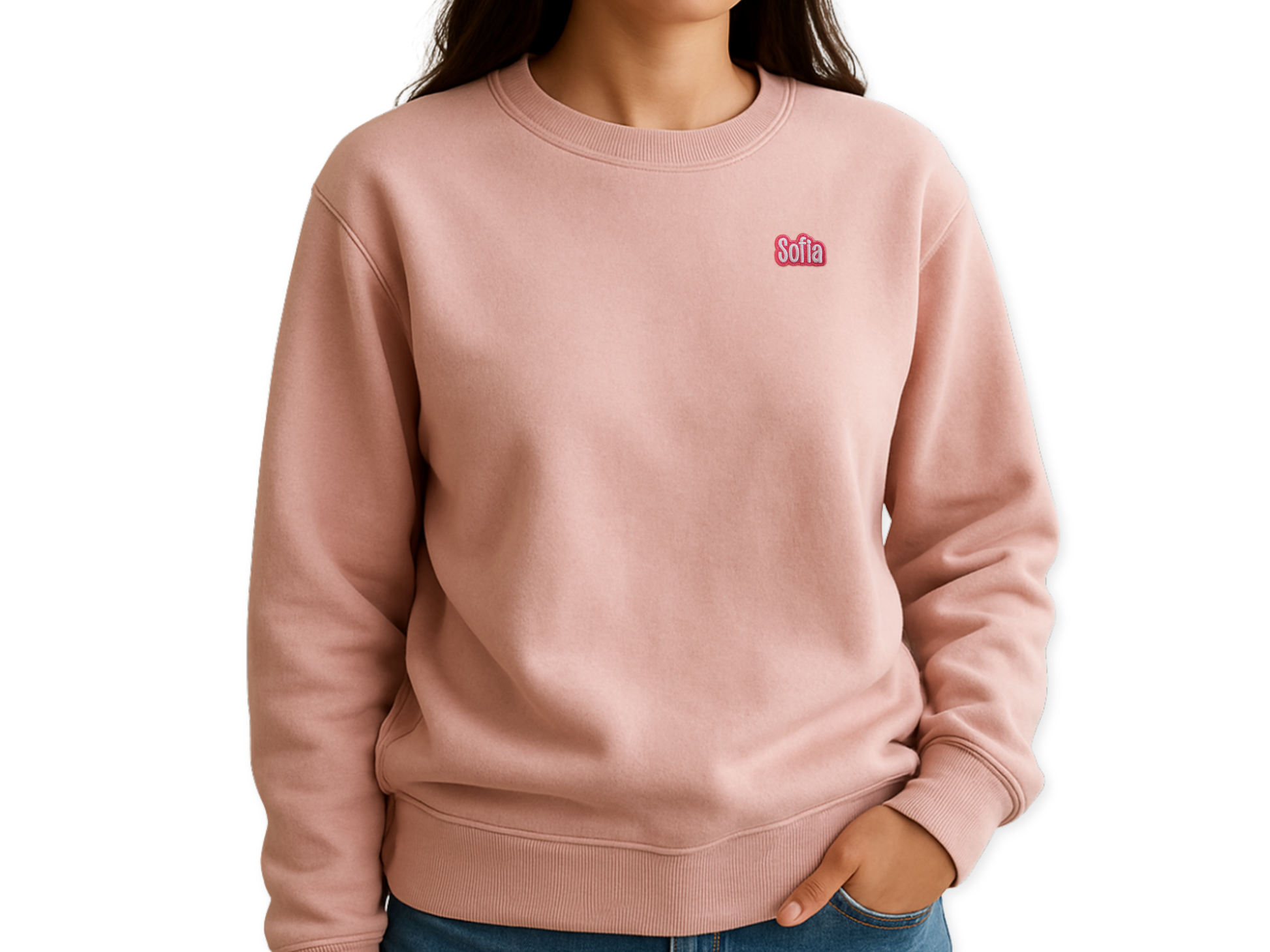 Sofia custom name patch with a pink embroidered border applied to a pink crewneck sweatshirt, worn by a model on a white background. Personalized patch mockup.