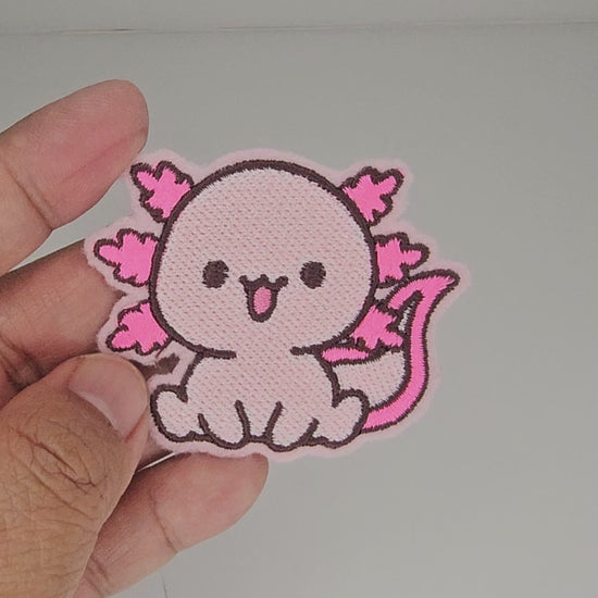 Video showing close-up details of the Happy Axolotl embroidered patch