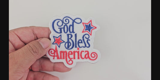 Product showcase video for a patriotic "God Bless America" patch featuring high-quality embroidery and vibrant red and navy blue script.